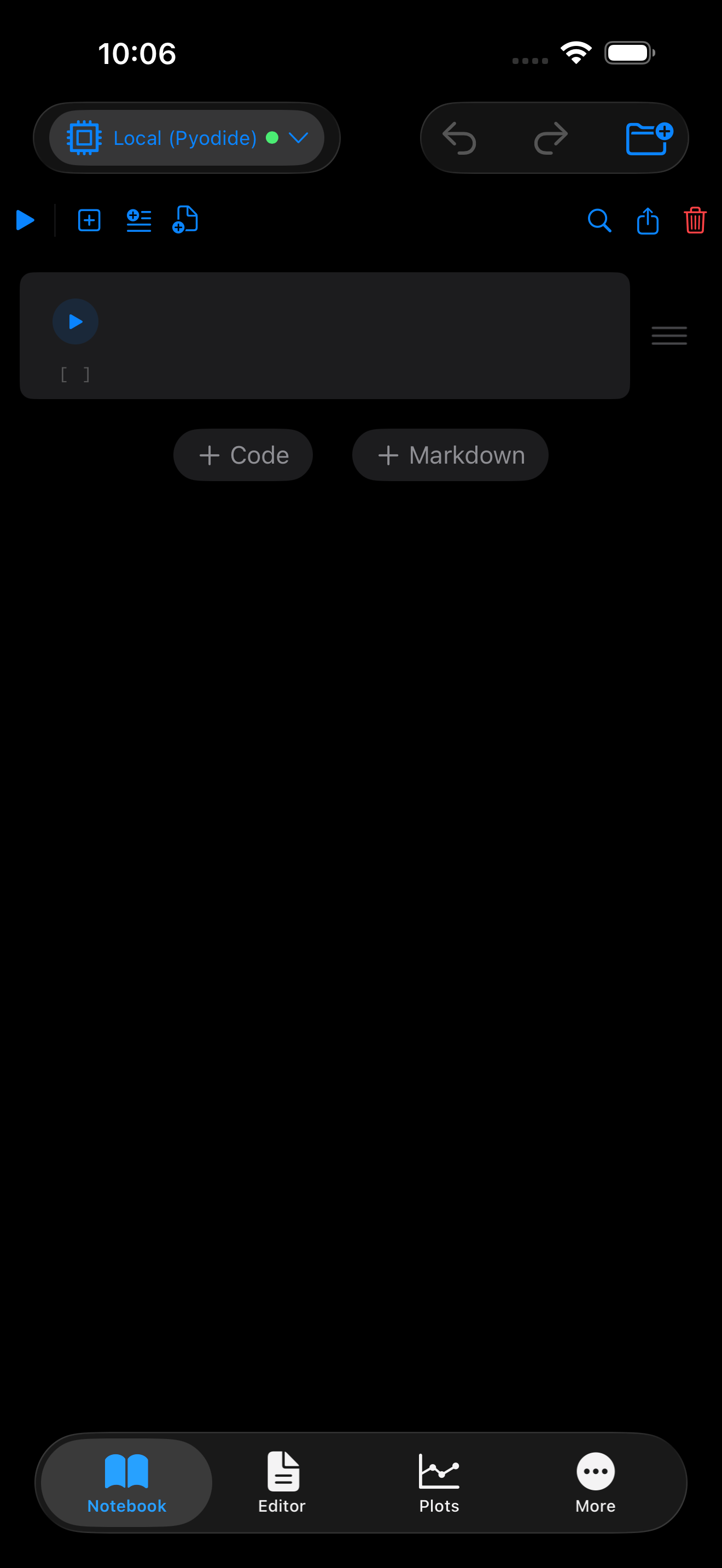 Blank notebook ready for input on iPhone in dark mode